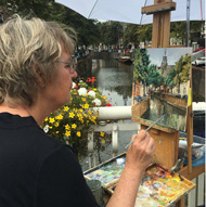 Ineke Mahieu schildert en plein air bij De Hollandsche Maagd